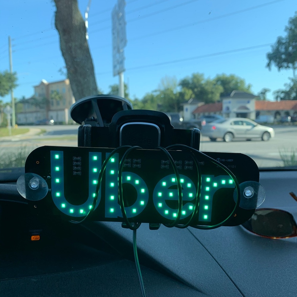 Glowing sign UBER